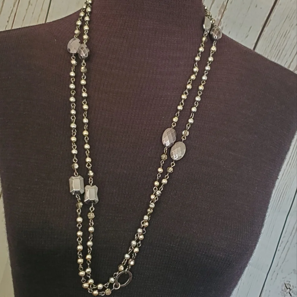 Silvertone and black bead and geometric stations necklace